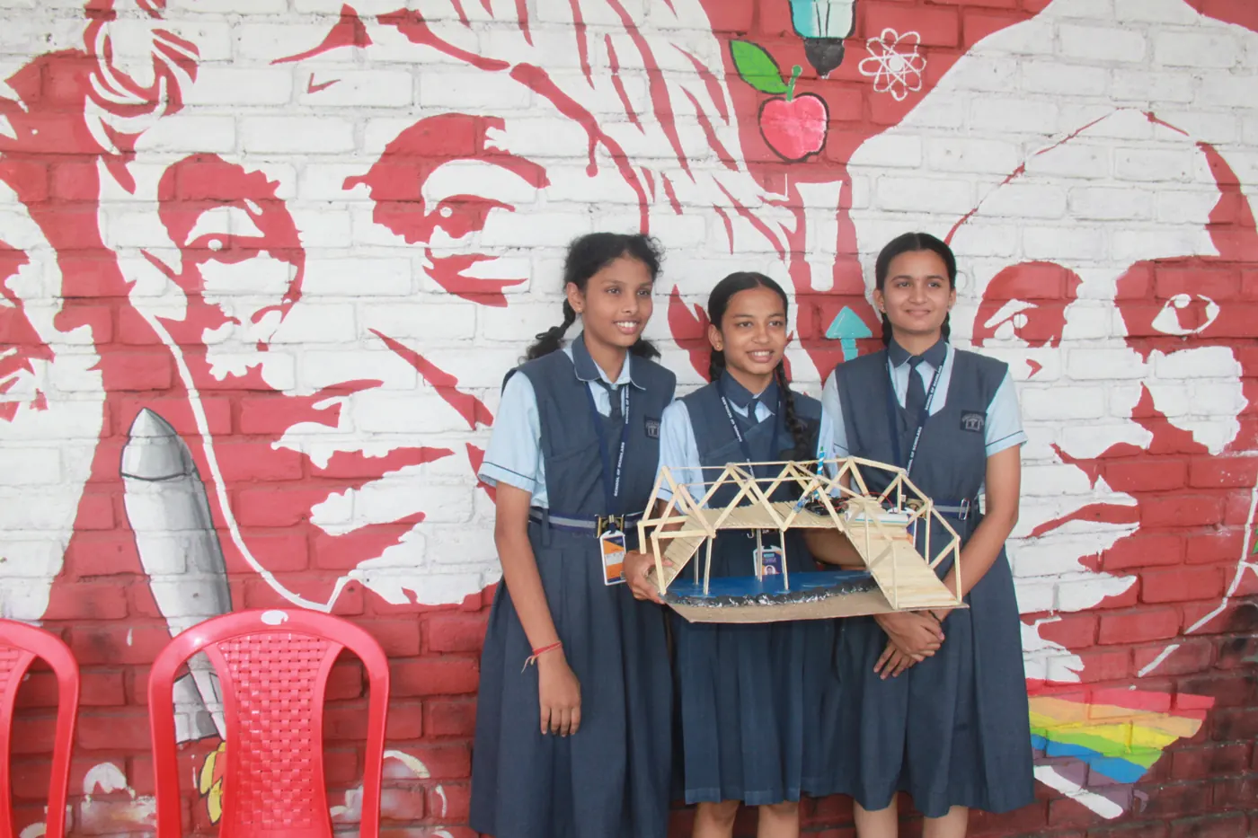 Students with a bridge model they built